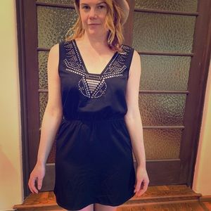 Black mini dress with metallic rhinestone design